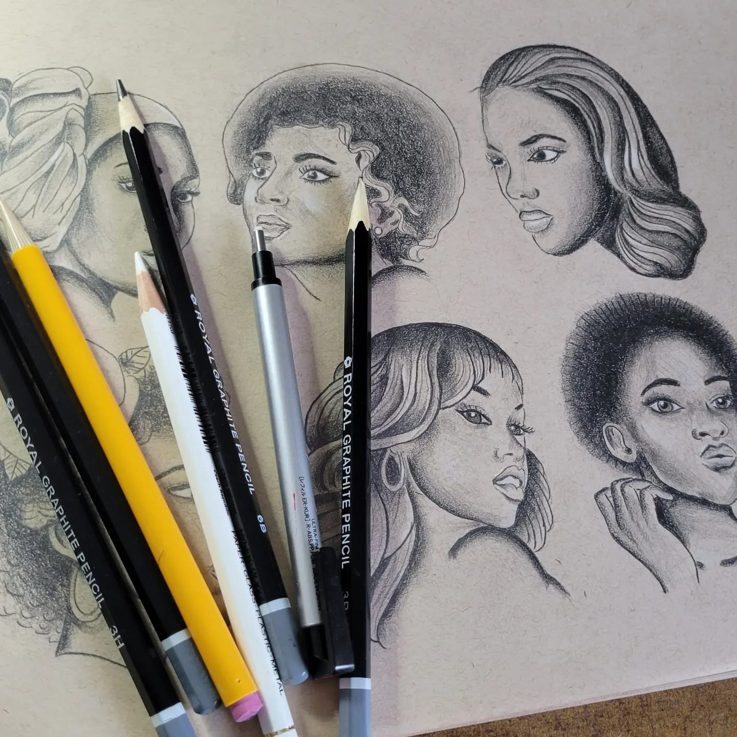 Graphite portrait studies of women