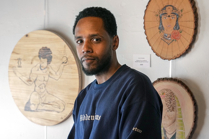 Original works exhibited on gallery wall